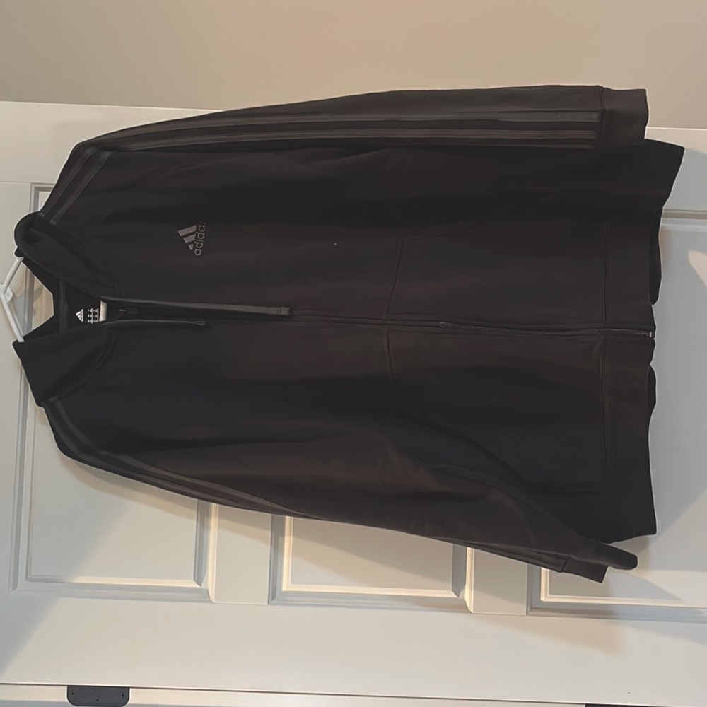 Black 3 stripe Adidas zip up hoodie.
